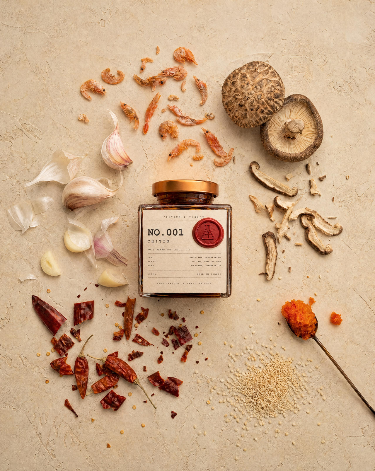 NO.001 Chitin — flat-lay of the jar with dried shrimp, shiitake, garlic, sesame, chilli and prawn roe on a warm plaster surface